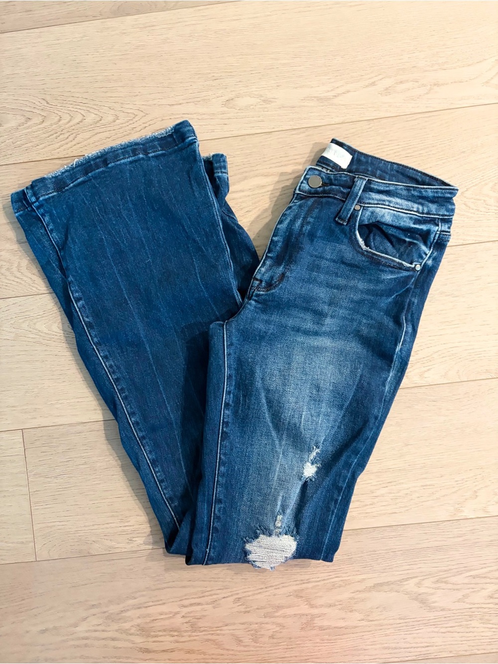 Petra Fashions Blue Flare Jeans with Distressed Detail